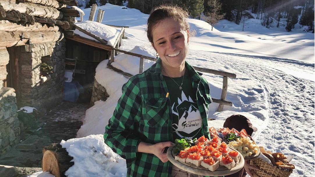 A waitress brings the afternoon snack