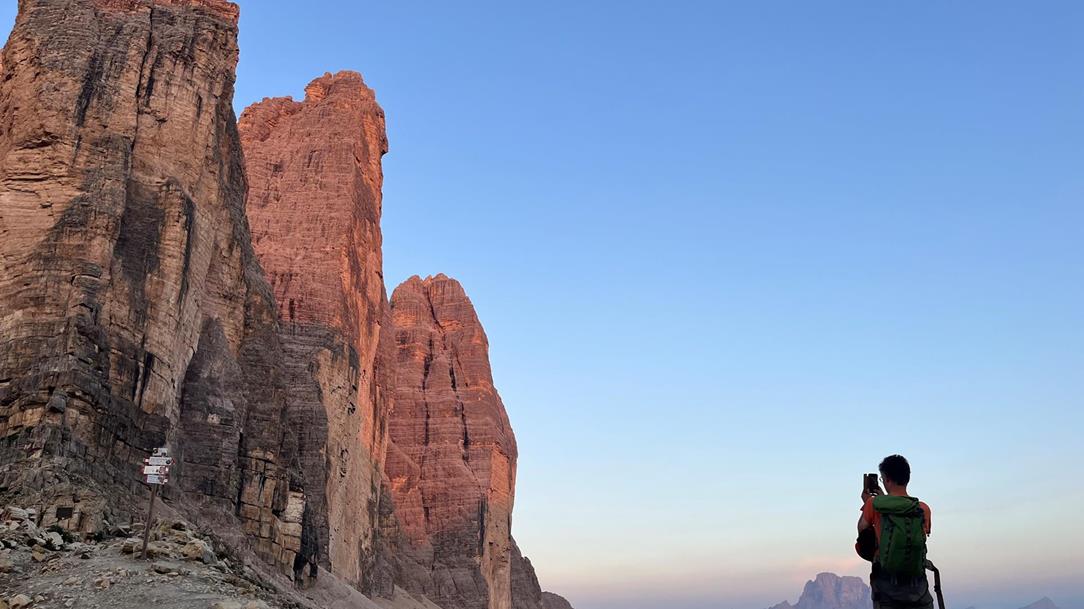 Someone takes a picture of the Three Peaks