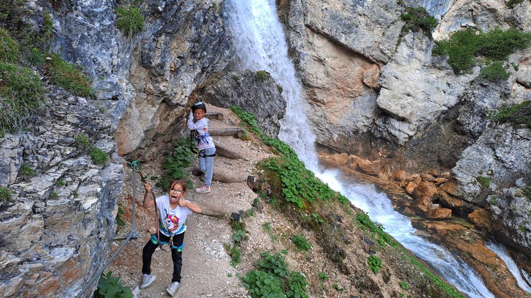 Kids climb in the Fanes Gorge